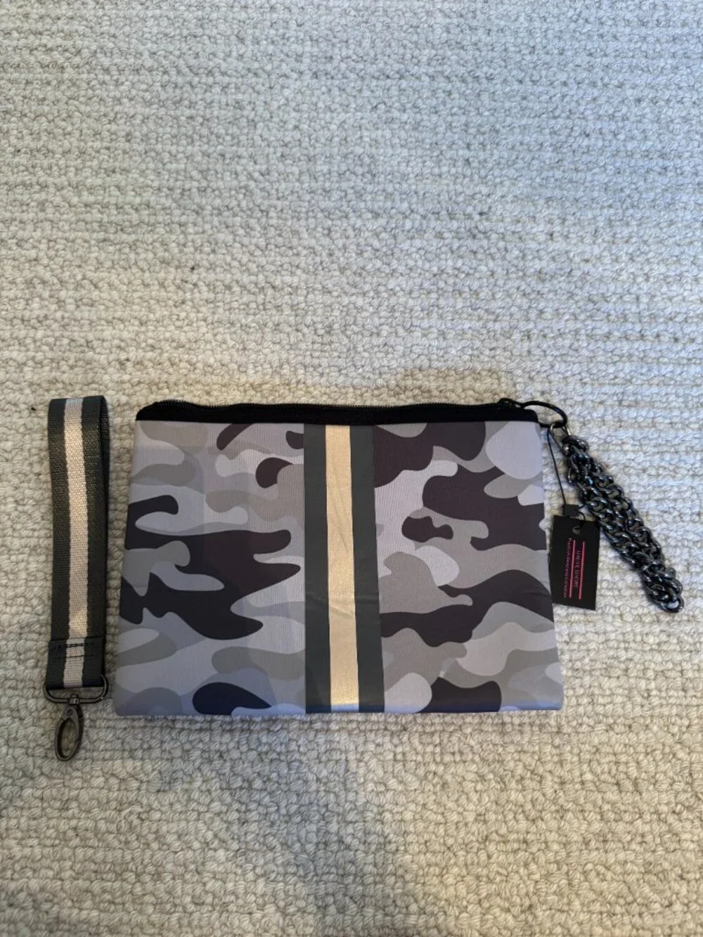 New with tags (NWT) Haute Shore Clutch/wristlet bag.